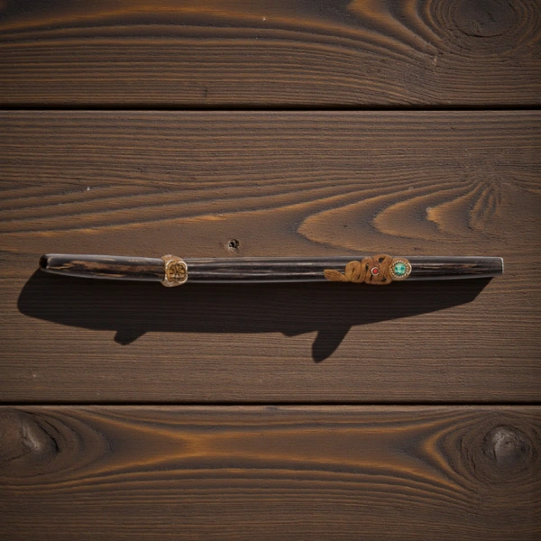 Tepi aus Chonta mit Medaillion 4