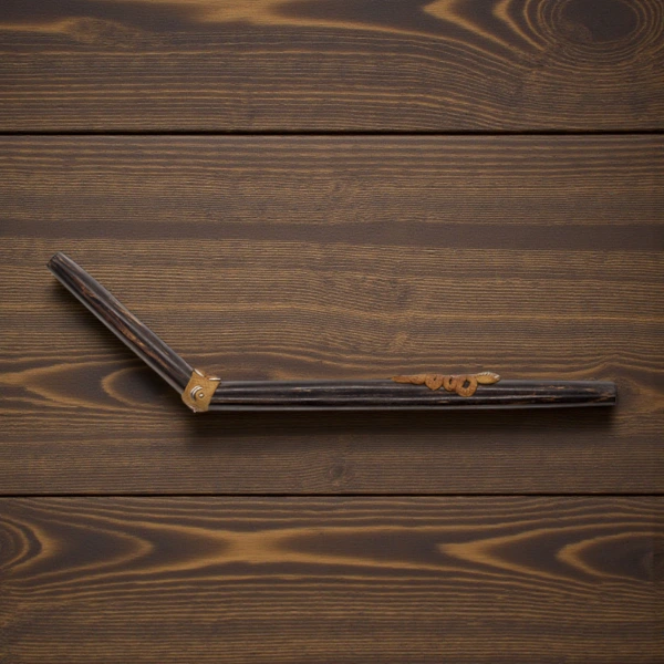 Tepi aus Chonta mit Medaillion 2